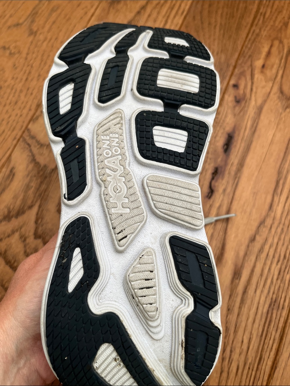 Hoka Bondi 7 woman’s Running Shoes in Light Gray with Navy and Orange Accents - Picture 3 of 4